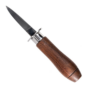 Crafts La Marée Oestermes 6.6 cm met walnotenhouten heft, vrijstaand op witte achtergrond
